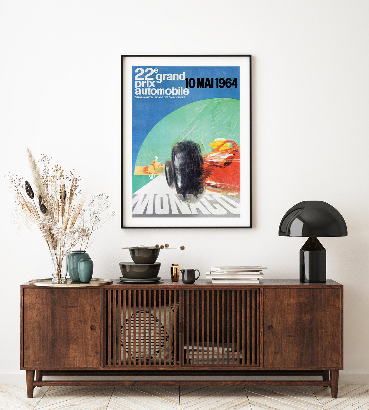 white and red race car against a colourful blue, green background and with text in white and black.