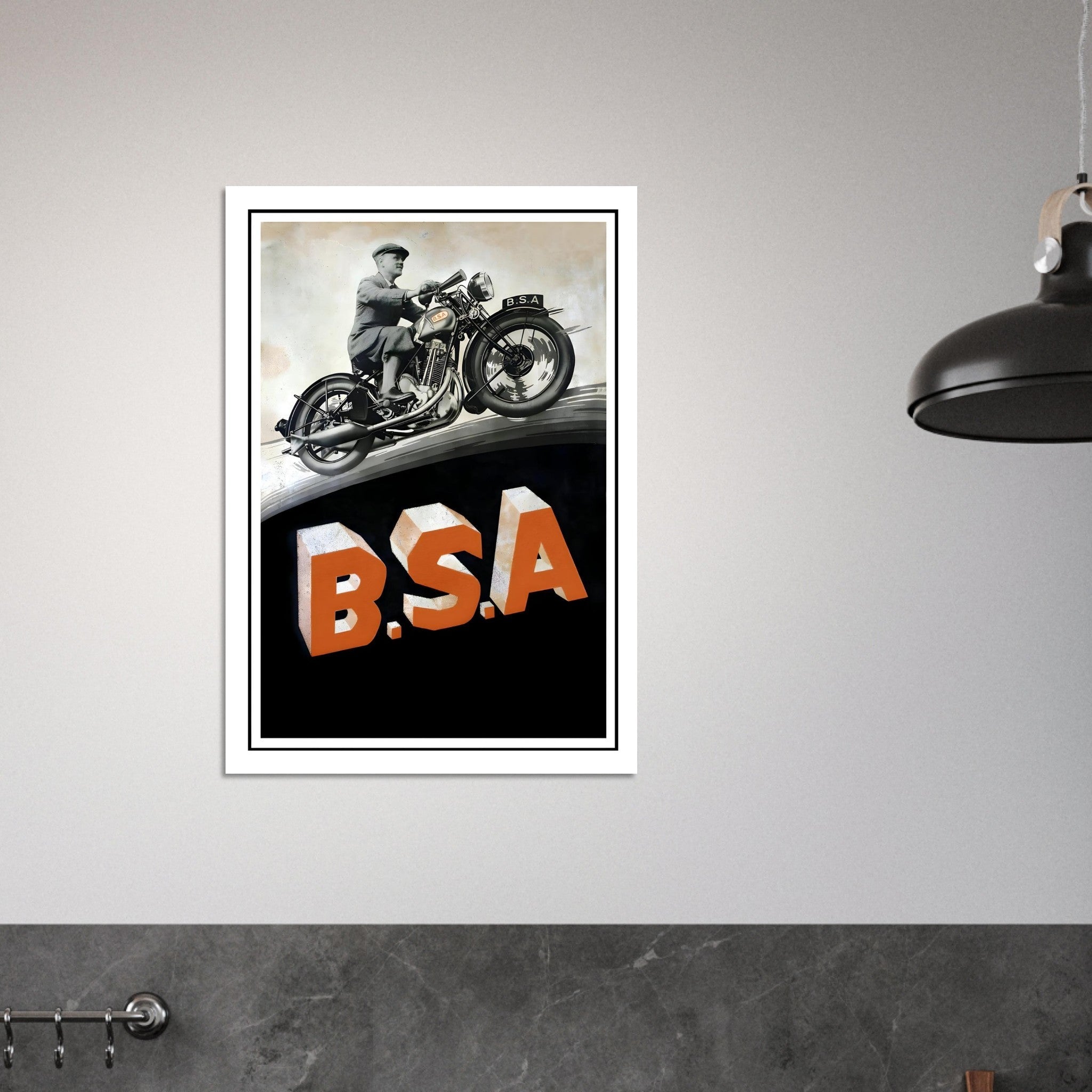 Classic BSA motorcycle poster featuring a man on a vintage motorcycle over bold B.S.A. letters.