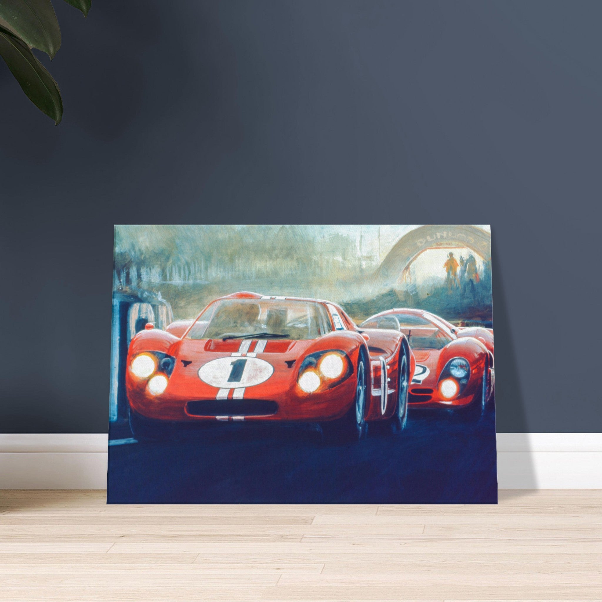 Canvas of A Ford GT40 and against a Ferrari P4 after the Dunlop curve at Le Mans in 1967, just before sunset.