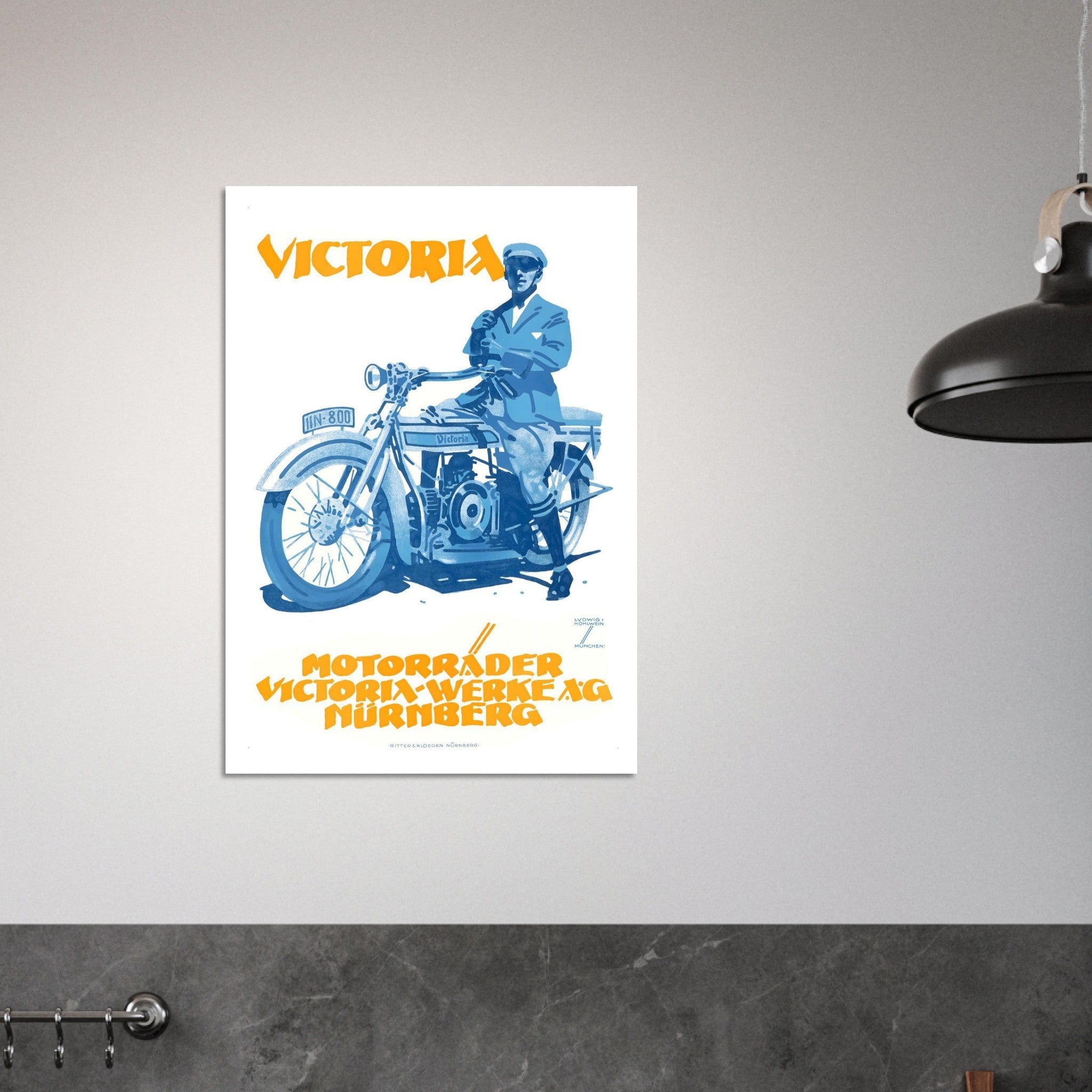 Vintage Victoria motorcycle poster featuring a man beside a blue motorcycle and bold orange lettering.