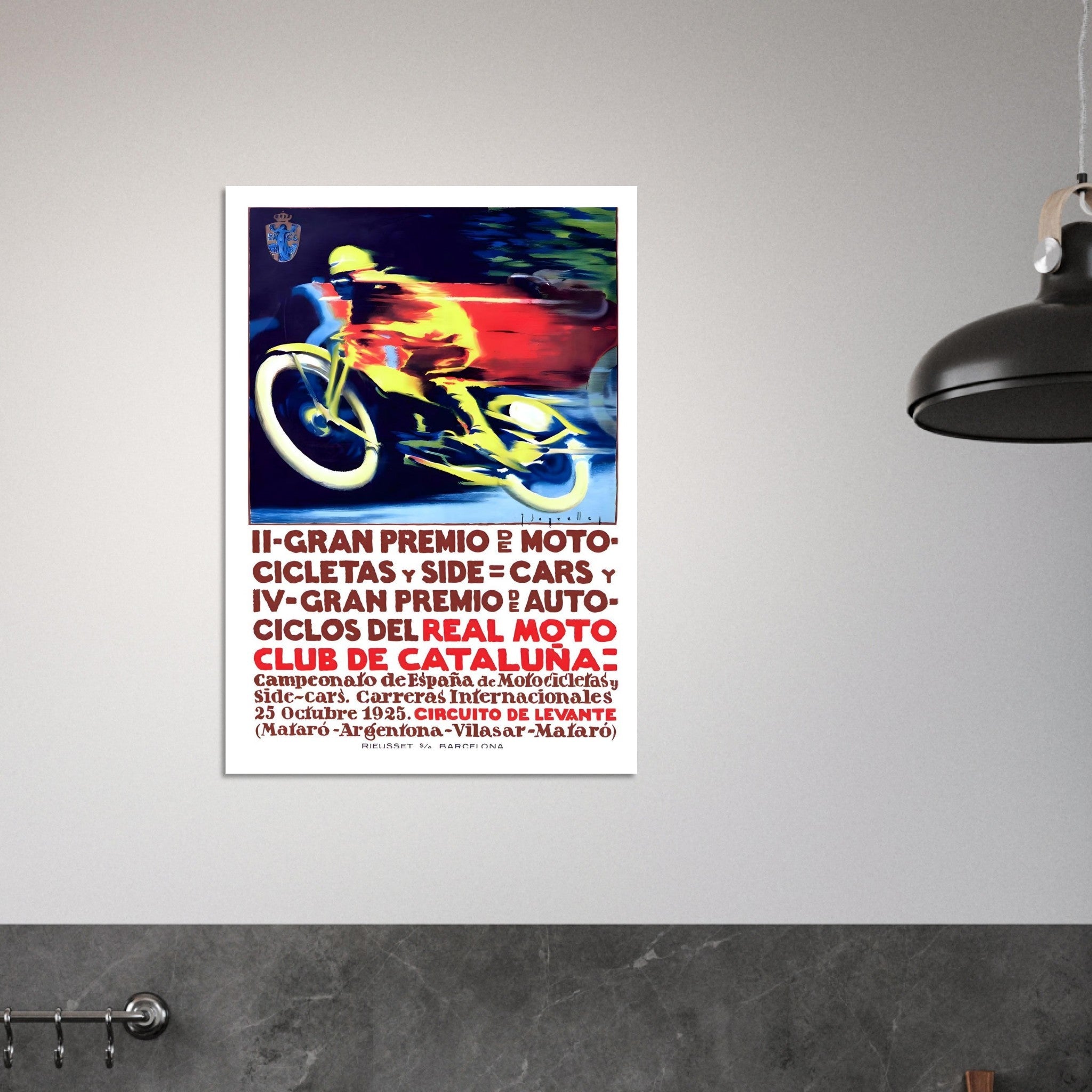 1925 Gran Premio de Cataluña motorcycle poster featuring a vibrant motorcycle racing design on a wall.