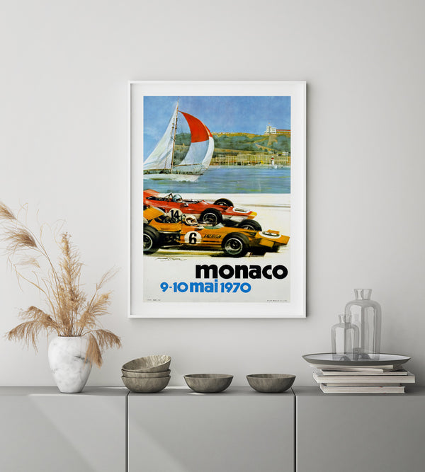 2 race cars seen from the side in high speed. Monaco text in black and a background with Monaco siluette and a sail boat