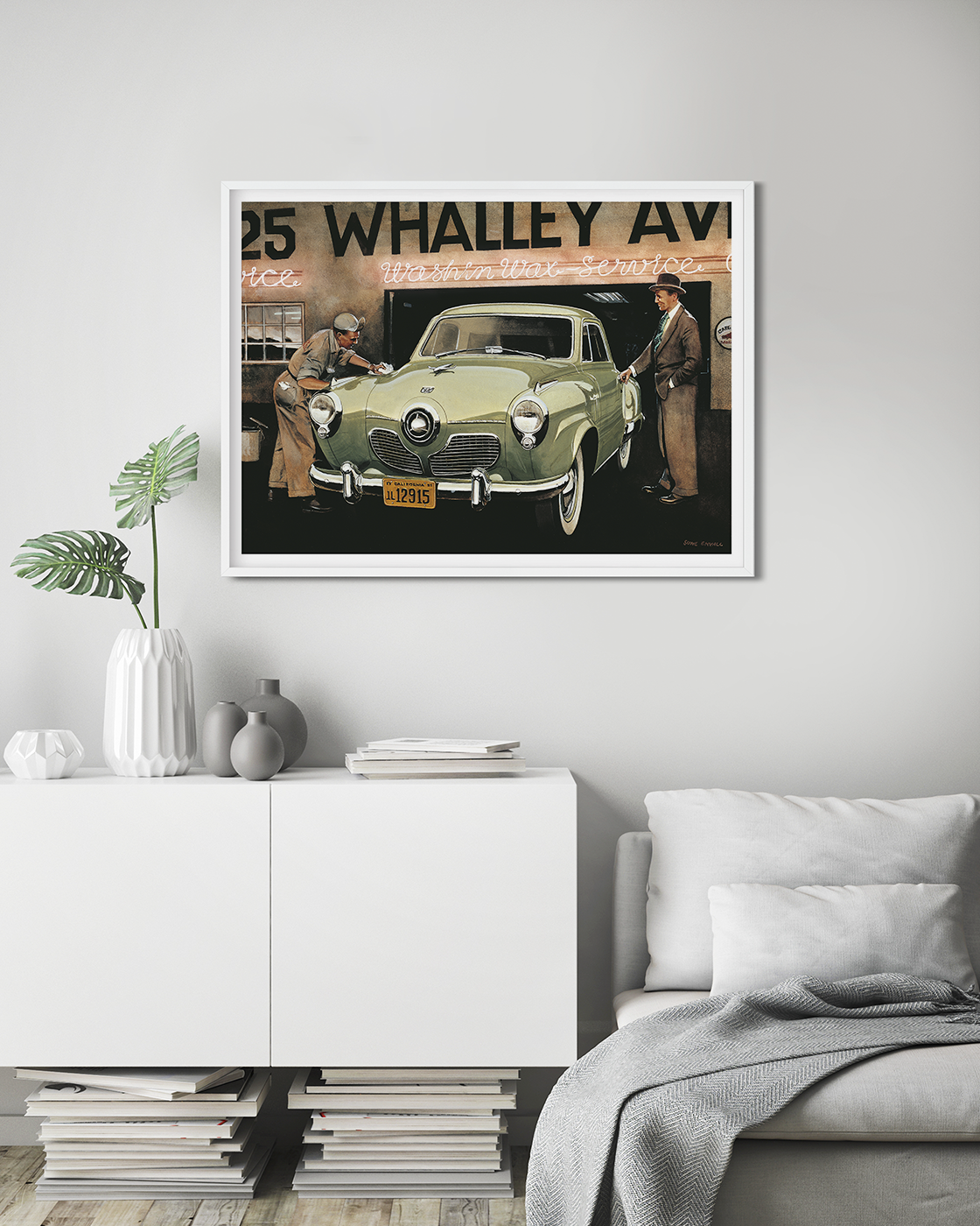 A classic Studebaker being picked up from the car wash.