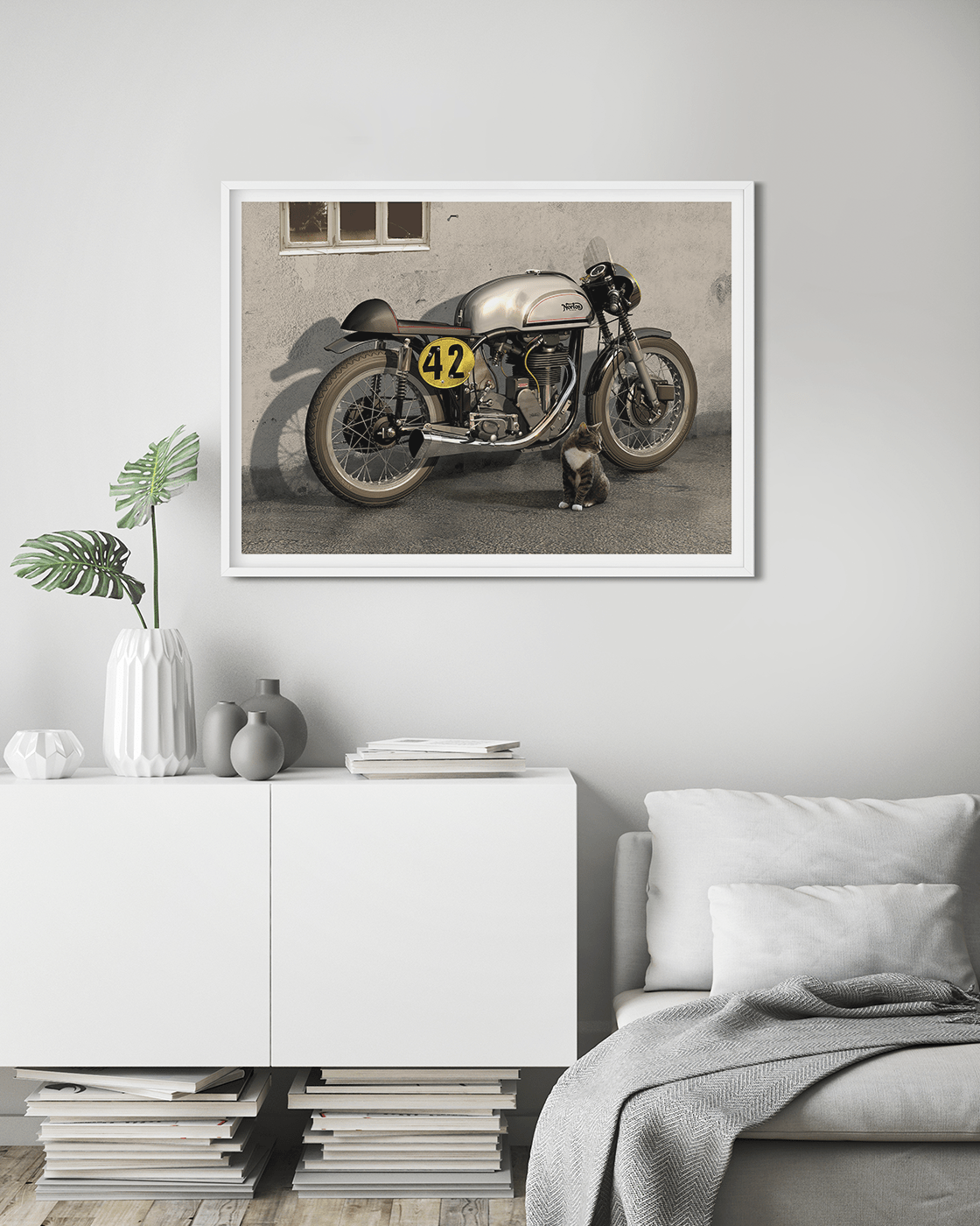 Two Cats, A classic Norton Manx motorcycle. While the original Norton Manx production ceased in the 1960s, the spirit of the Manx lives on in various vintage racing events and classic motorcycle showcases. Several restoration and replica projects strive t